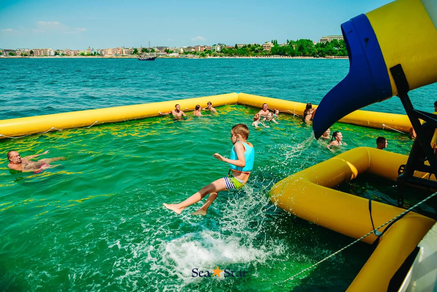 people jumping in the water